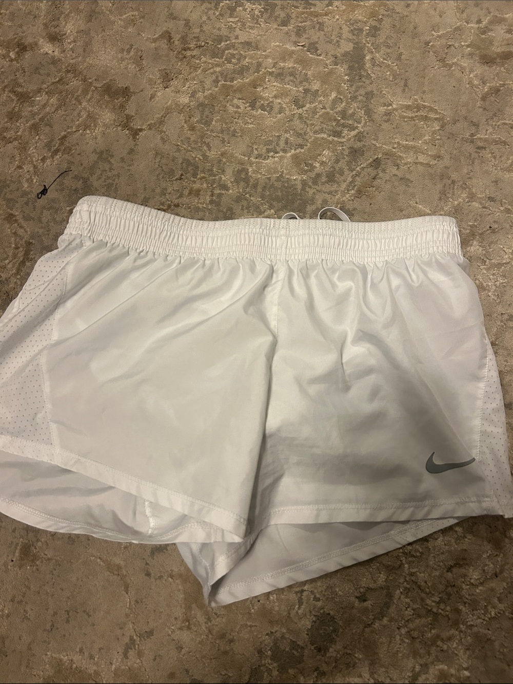 Nike Women's White Athletic Shorts with Silver Swoosh